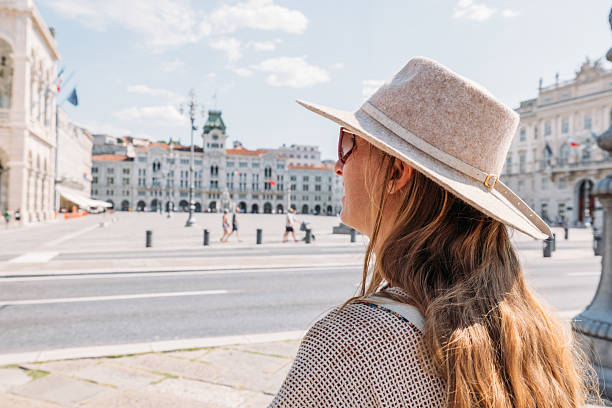 istock Woman Wearing Hat in Trieste City Square 2231780366