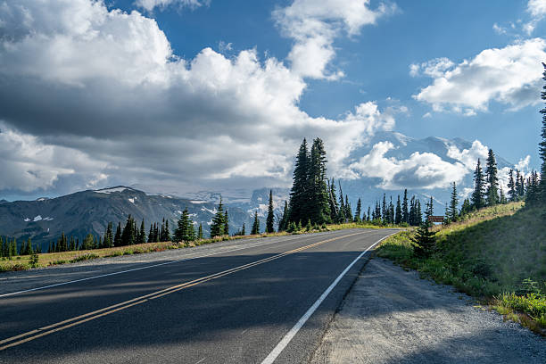 istock Snow-Capped Mount Rainier with Evergreen Forest, Pacific Northwest, USA 2231790372