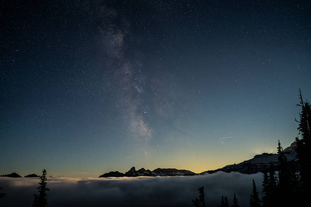 istock Starry Night Sky with Milky Way over Mount Rainier, Pacific Northwest, USA 2231793201