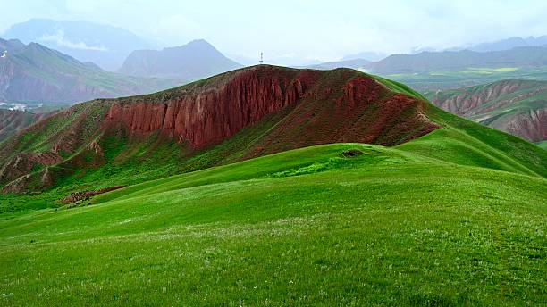 istock Grassland scenery, Danxia landform, rape flowers 2231795195
