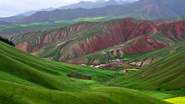 istock Grassland scenery, Danxia landform, rape flowers 2231796022