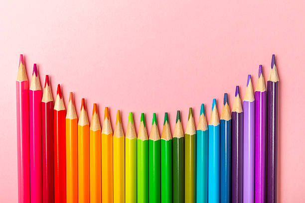 istock Colored pencils on a bright colored background. Equipment for coloring. Stationery for creativity.Back to school. Flatlay. Children's Creativity and Education. Rainbow.Space for text. Copy space. 2231796572