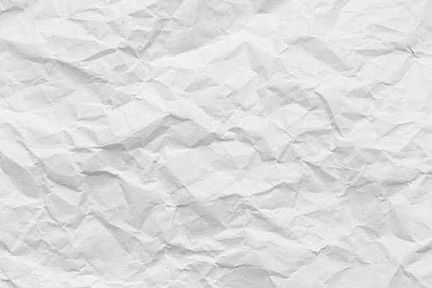 istock Close-up macro white crumpled paper texture,Macro white crumpled paper background,White crumpled paper texture background. 2231798630