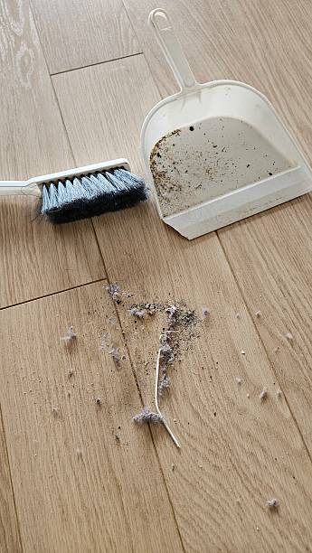 istock Sweeping the floor. Broom and shovel. 2231802923