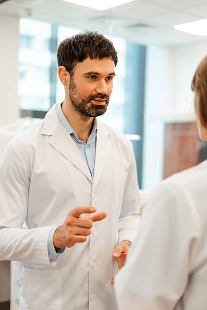istock Two doctors having a conversation about a medical issue in a hospital 2231804190