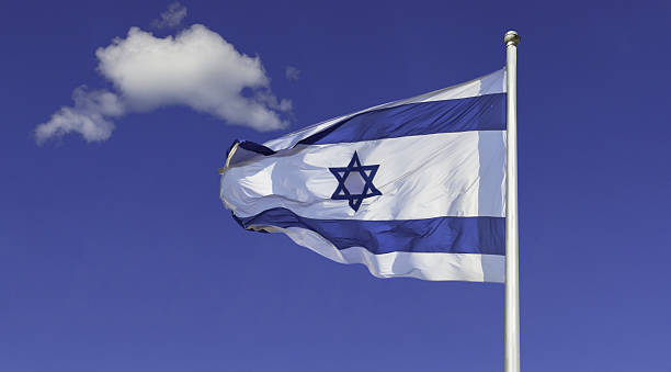 istock Israel,Flag,Flapping,In,The,Wind,Isolated,Against,The,Blue 2231806326