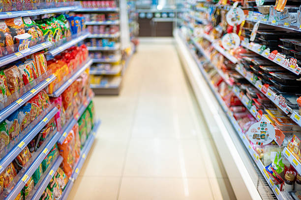 istock Abstract blurred colorful supermarket shelf 2231807490