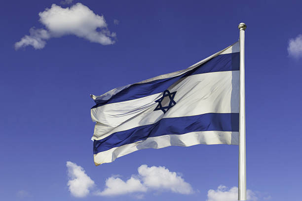 istock Israel,Flag,Flapping,In,The,Wind,Isolated,Against,The,Blue 2231809329