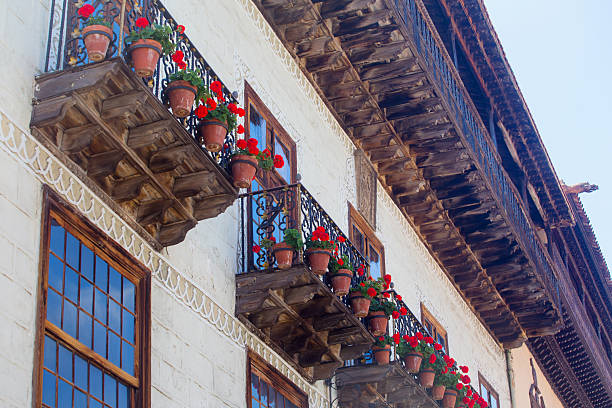 A decorated and flower-filled street in the town of Candeleda in the province of Ávila, located in the Sierra de Gredos mountains in Spain.