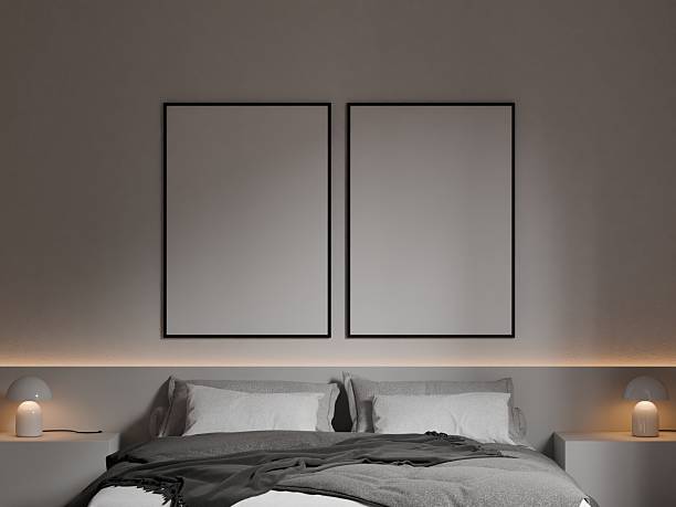 istock Modern Minimalist Bedroom Interior with Grey Bed, White Pillows, and Cozy Ambient Lighting - 3d Render 2231814434
