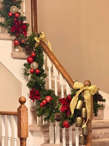 istock Christmas garland on staircase 2231817073