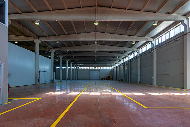 istock Inside of empty large  factory or warehouse. 2231818033