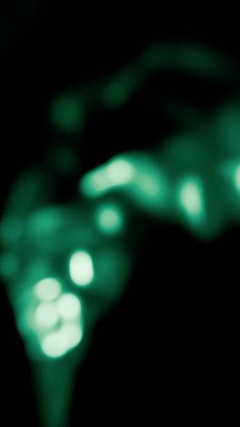Abstract digital art featuring a blurred composition with turquoise and black color