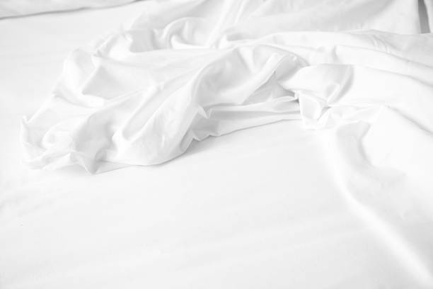 istock Soft white bedsheets, soft focus in hotel bedroom, home, accommodation. 2231829727
