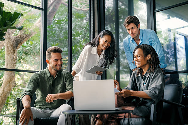 istock Multicultural professional businesspeople working together on research plan in boardroom. 2231830741