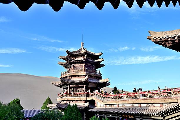 Dunhuang City, Gansu Province, and the Mingsha Mountain Crescent Spring Scenic Area in Jiuquan City.The area of the scenic spot is 76.82 square kilometers, and the core scenic area is defined as 12.79 square kilometers. This place is renowned worldwide for its unique desert spectacle where springs and water from the sand coexist. It is hailed as \
