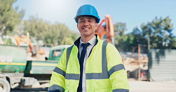 istock Man, architect and happy at construction site, portrait or pride for urban infrastructure development. Person, technician or engineer with smile, helmet and outdoor for property expansion in Mexico 2231836007