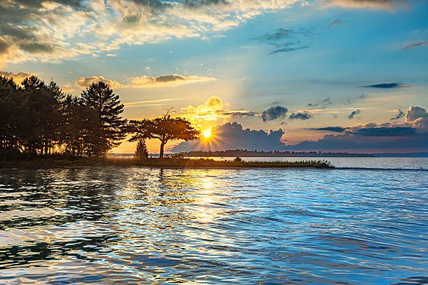 Detroit Point Sunbeam Sunset, Higgins Lake, Michigan.