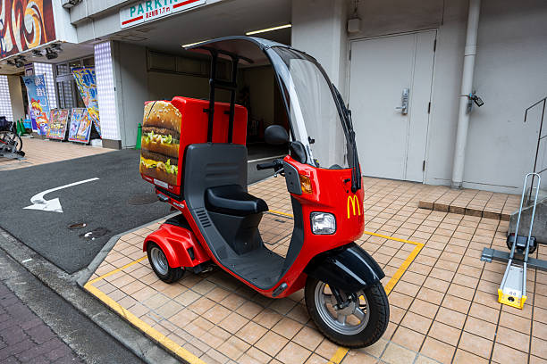 Tokyo, Japan - July 7, 2025 : McDelivery scooter in Tokyo, Japan.