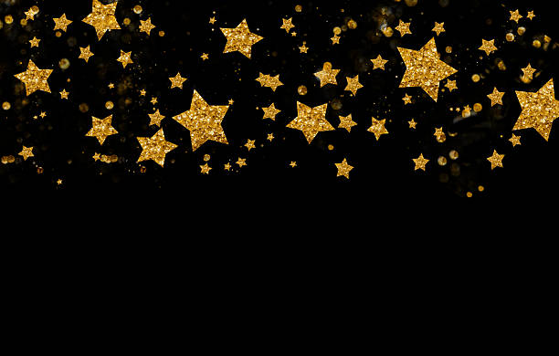 many golden stars  in motion copy space