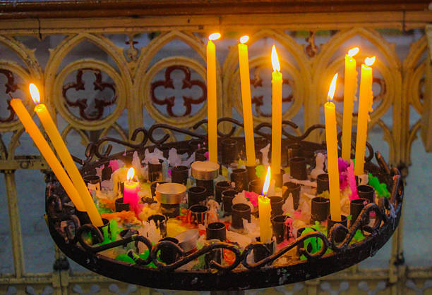 istock Warm glowing candles casting a serene, ambient light 2231844504