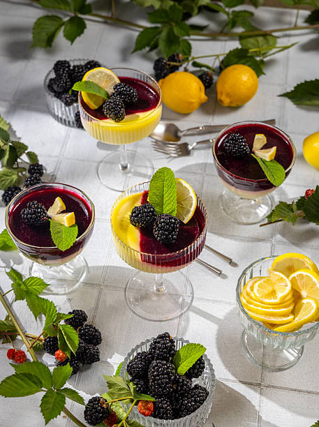 istock Delicious lemon and blackberry dessert cups garnished with fresh mint 2231852876