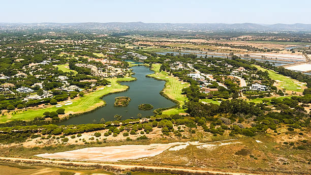 African golfer looking down the fairway, preparing his shot. Langebaan, Western Cape, South Africa