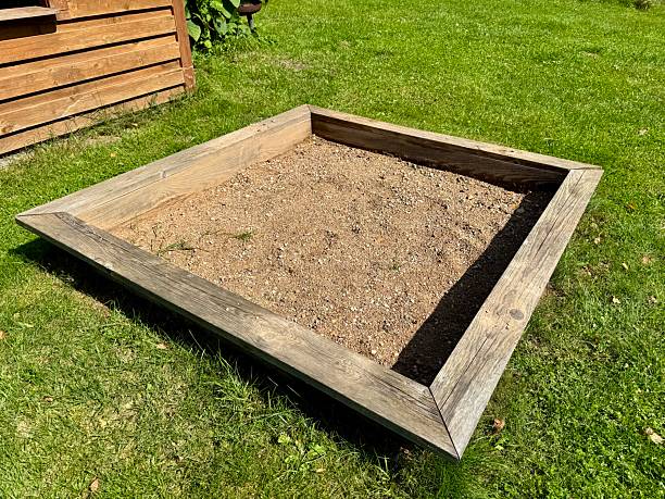 istock Empty wooden sandbox in garden 2231862131