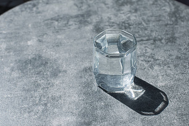 istock Glass of water on table 2231868706