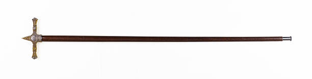 istock golden magic cane isolated on white background 2231871763
