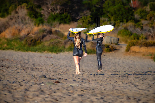 Malibu, California USA, October 23 2015 Surfing,sport or pastime of riding a wave towards the shore while standing or lying on a surfboard at Leo Carrillo State Park