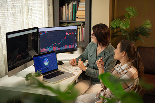 istock Women Investors Analyzing Stock Data Using Multimodal AI Technology 2231873024