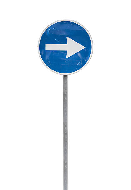 istock Blue circular traffic sign with a white arrow pointing right, isolated on a white 2231874407