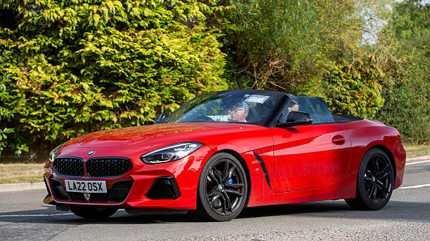 Whittlebury,Norhants,UK - Aug 23rd 2025:  2022 red BMW Z4 convertible  car driving on a British road