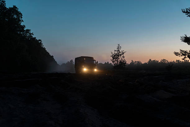 istock Military Truck Dusk 2231876019