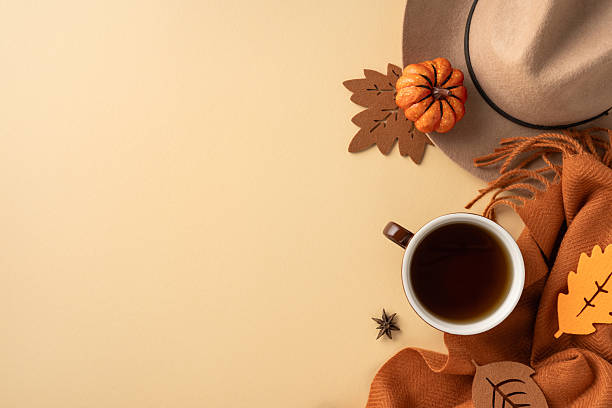 istock Cozy flat lay showcasing a rustic autumn vibe, featuring a warm drink and fall accents 2231879842