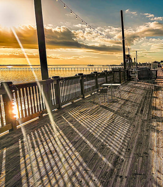 istock Where Sunset and Water Meet: Solitude on Navarre’s Waterfront Boardwalk 2231887650