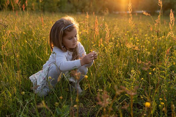 istock Happy Child Connecting With Nature At Sunset. Serenity 2231896289