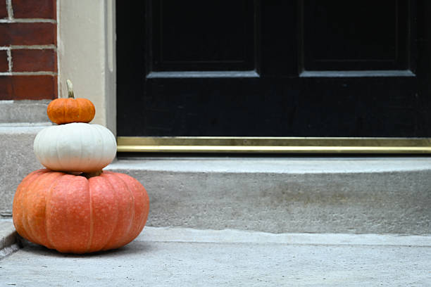 Porch pumpkin decoration for autumn holidays, thanksgiving and Halloween