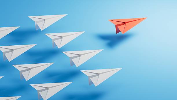 istock Different business concept.new ideas. paper art style. creative idea.Leaderplane concept, blue leader plane leading white planes.3D rendering on blue background. 2231900930