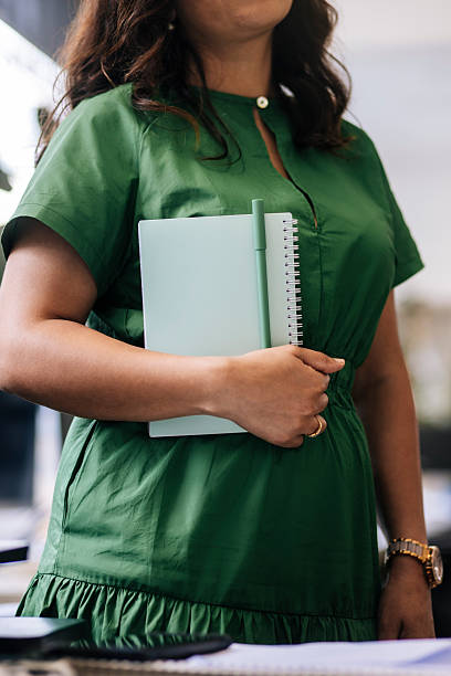 istock Close up of manager with textbook 2231901432