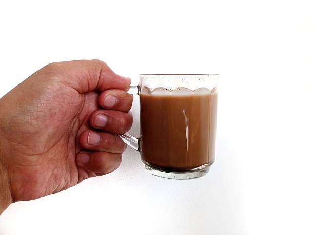 istock Hand pose holding a glass of coffee 2231902096