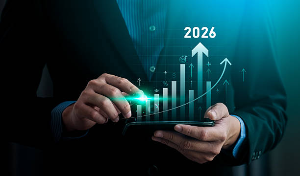 istock 2026 growth strategy concept with businessman using digital tablet and futuristic bar chart, symbolizing financial planning, data analytics, performance forecast, and upward business success trend 2231903615