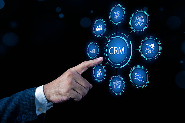 istock CRM Customer Relationship Management concept. Businessman pressing button on screen, analyzes business sales marketing system Customer Service Employment and Leadership Business 2231910822