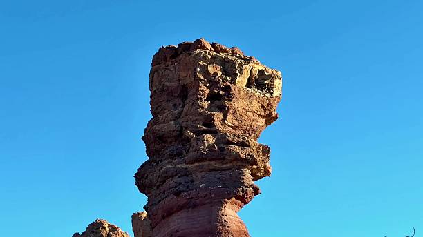istock A Striking and Truly Unique Geological Rock Formation Set Against a Clear and Bright Blue Sky 2231911468