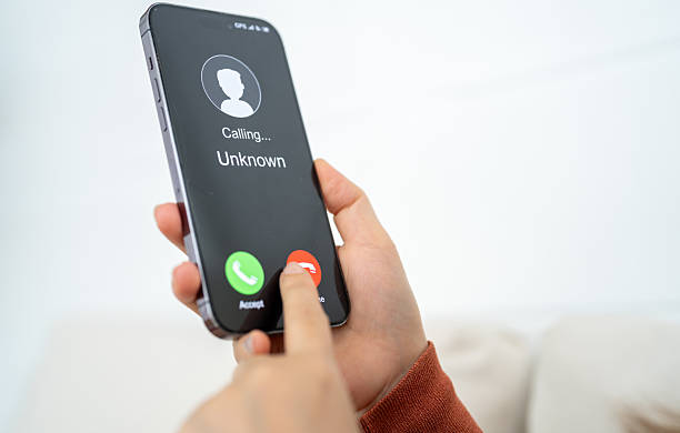 istock Phone scam alert with hacker and scammer calling unknown number, cybercrime, data theft, phishing attempt, fraud alert, digital security threat, cyber attack warning technology and crime concept 2231917993
