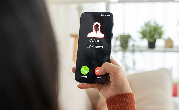 istock Phone scam alert with hacker and scammer calling unknown number, cybercrime, data theft, phishing attempt, fraud alert, digital security threat, cyber attack warning technology and crime concept 2231918009