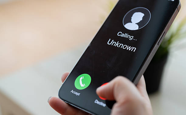 istock Phone scam alert with hacker and scammer calling unknown number, cybercrime, data theft, phishing attempt, fraud alert, digital security threat, cyber attack warning technology and crime concept 2231918011