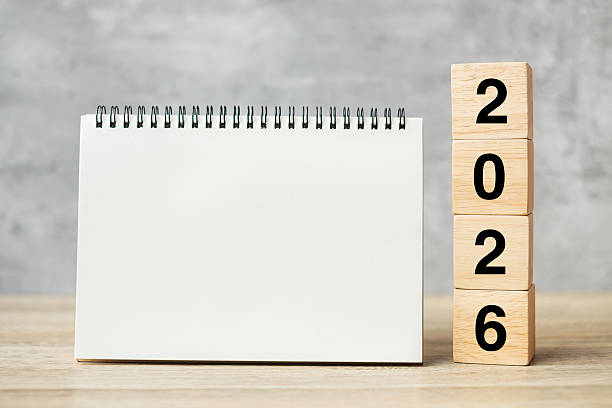 istock 2026 Happy New Year with blank notebook and wooden number. countdown, Resolution, Goals, Plan, Action and Mission Concept 2231922580