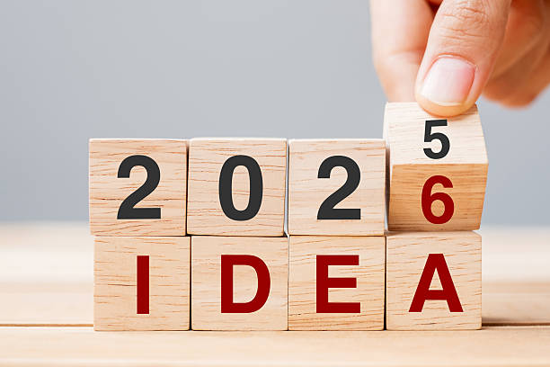 istock hand flipping block 2025 to 2026 IDEA text on table. goal, Resolution, strategy, plan, motivation, reboot, business and New Year holiday concepts 2231922629